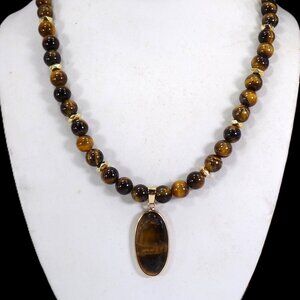 Tiger eye stone pendant necklace with an oval stone pendant with round 8mm beads